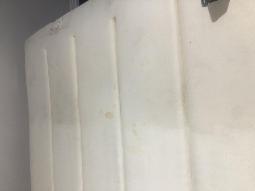 Before photo of mattress clean in Edgwater. 