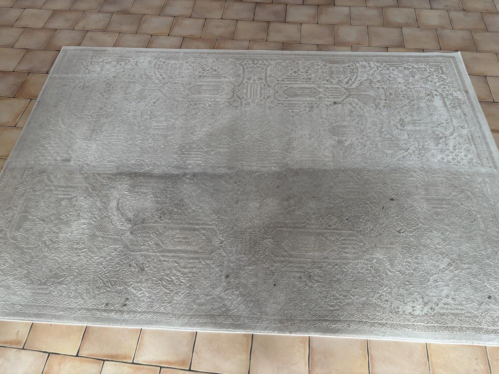 Before photo of rug cleaning in Kingsley. 